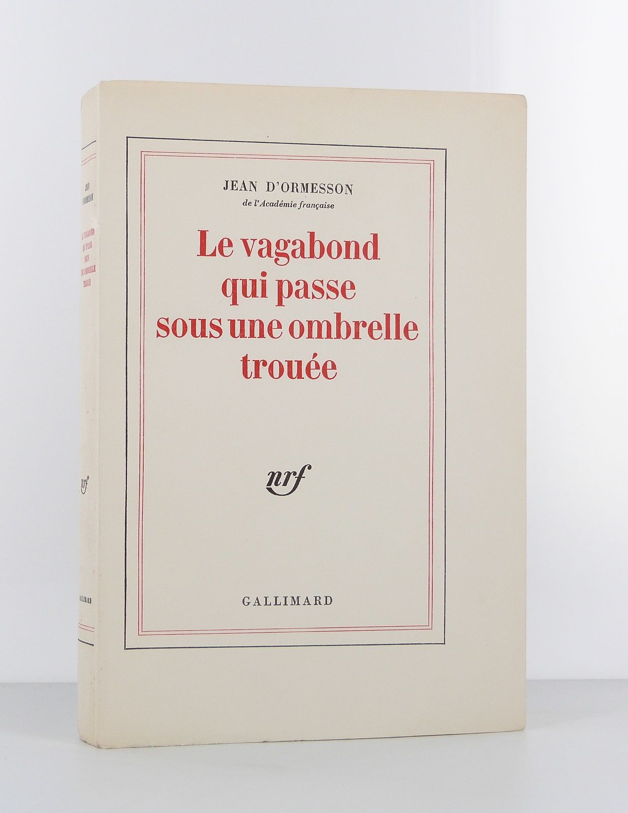 Le vagabond qui passe sous une ombrelle trouée